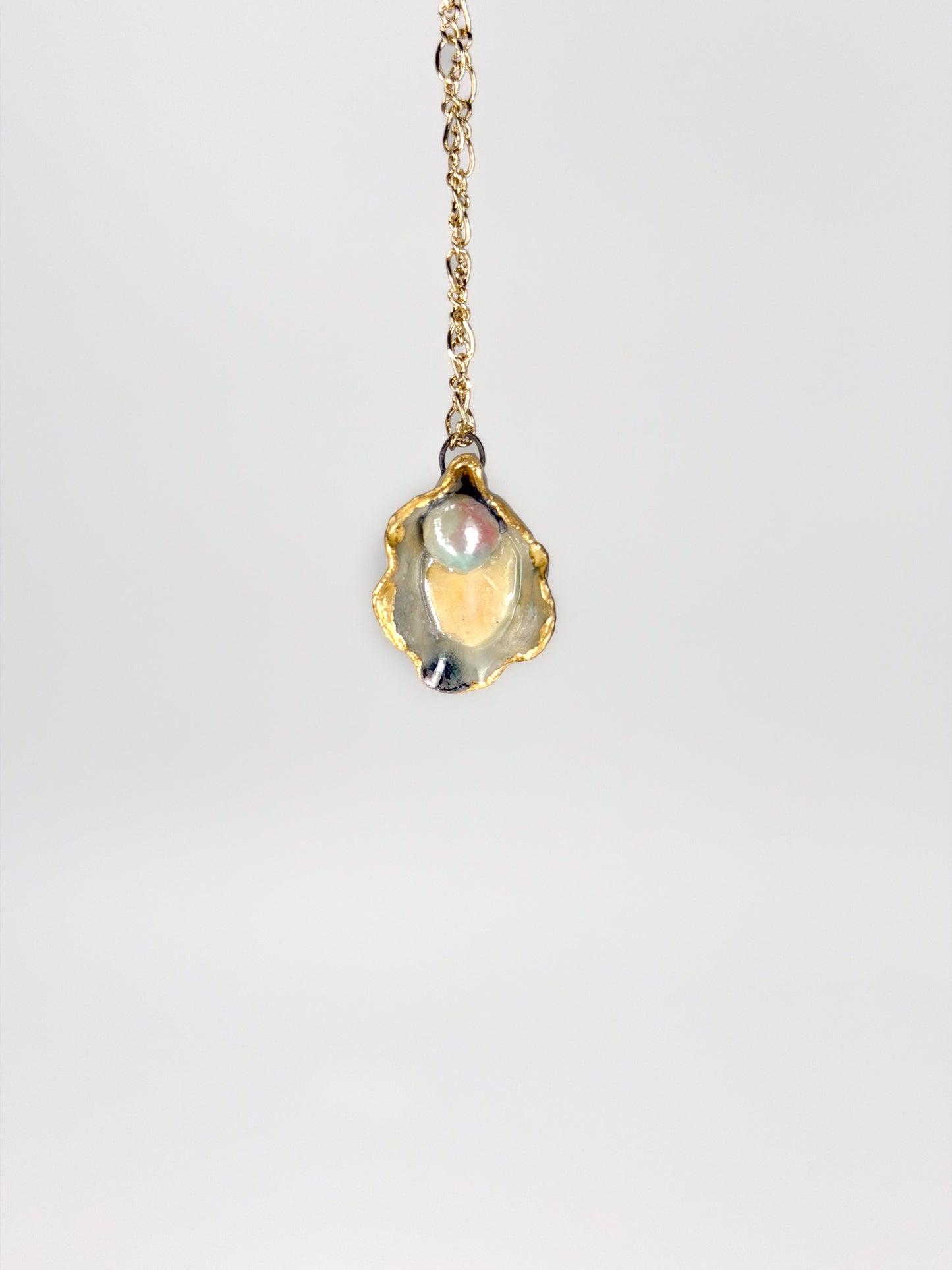 Spotted Oyster Charm