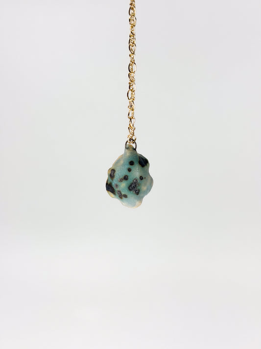 Spotted Oyster Charm