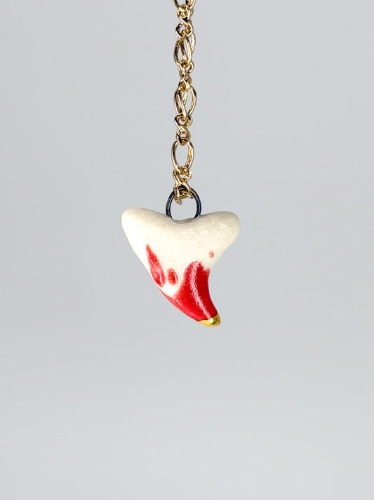 Tooth of a Predator Charm